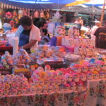 All of October, the Mexican markets prepare for Dia de Muertos. Pictured here in Cuernavaca, an array of sugar skulls have gone on sale, along with bakery “coffins”, dancing skeletons and marigolds, that show the way home to the returning dearly-departed.