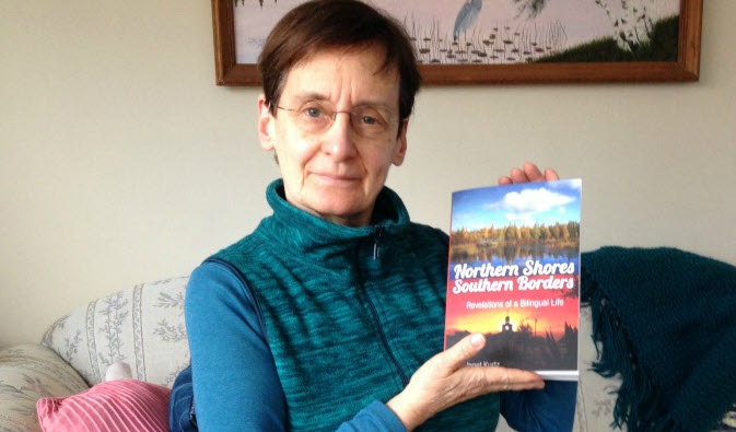 Janet Kurtz Holding Her New Book