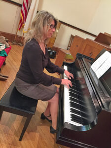 Laura R at piano-sm