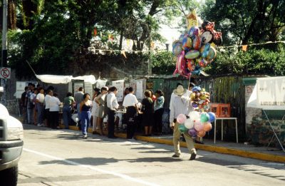 Voters lined up to cast their ballots in a festive street atmosphere